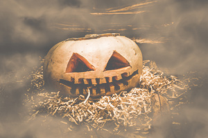 Rustic barn pumpkin head in horror fog
