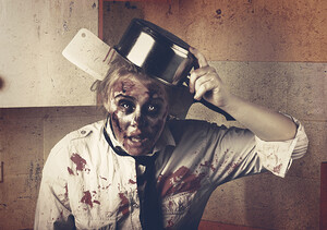Dead scary zombie girl cooking brains