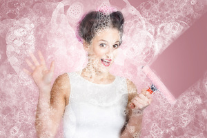 Retro window cleaning girl looking at clean glass