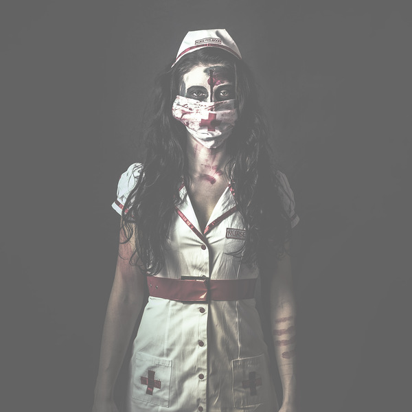 Nightmare nurse standing dead in haunted hospital Print