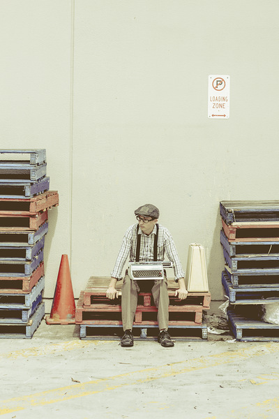 Retro man dreaming up literary ideas Print