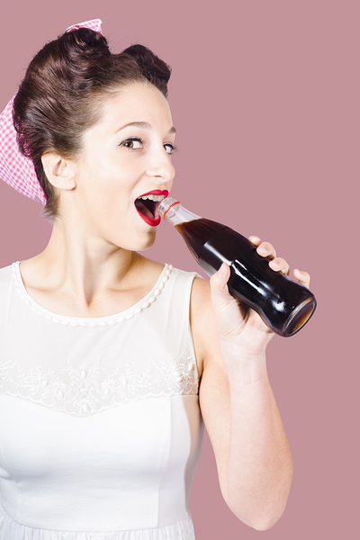 Old-fashion pop art girl drinking from soda bottle Print